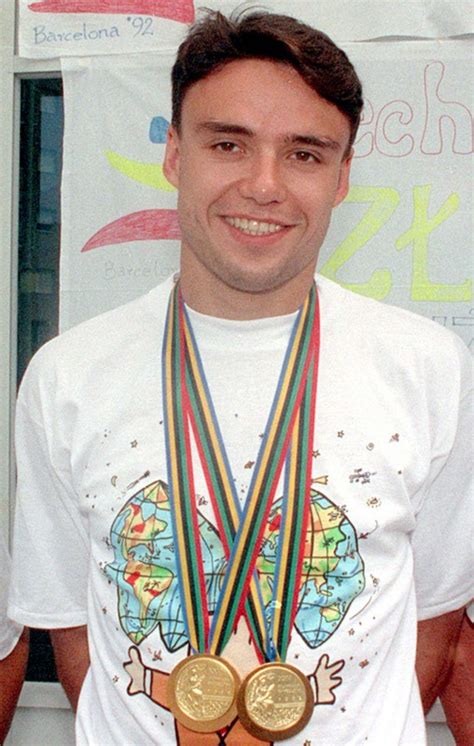 Arkadiusz Skrzypaszek z medalami olimpijskimi